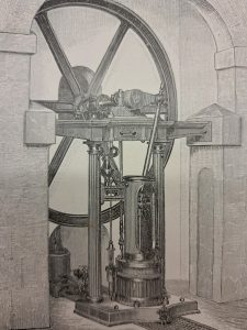 Un gravat d'època de la màquina de vapor Alexander amb un volant d'inèrcia prominent, columnes i components mecànics allotjats entre arcs de pedra.
